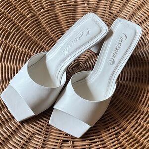 L’Intervalle White Leather Women's Mules